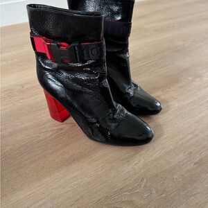 Christian Louboutin Black and Red Heels with Striking Design